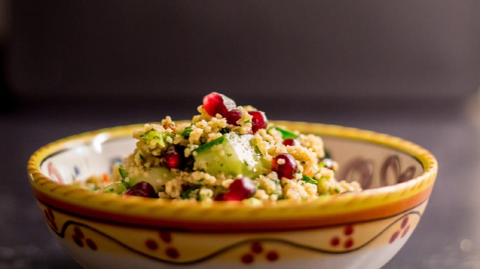 bowl of moroccan salad with pomegranate 